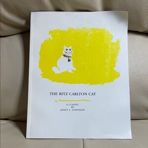 The Ritz Carlton Cat Book - White and Yellow Cover